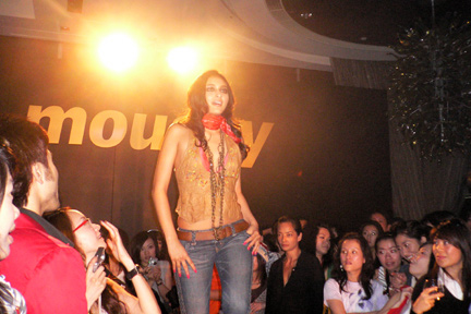 At the beginning of the runway.