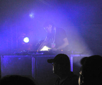 Adam F. performing in the tent.