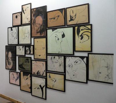 Smaller panels featuring ink on paper
